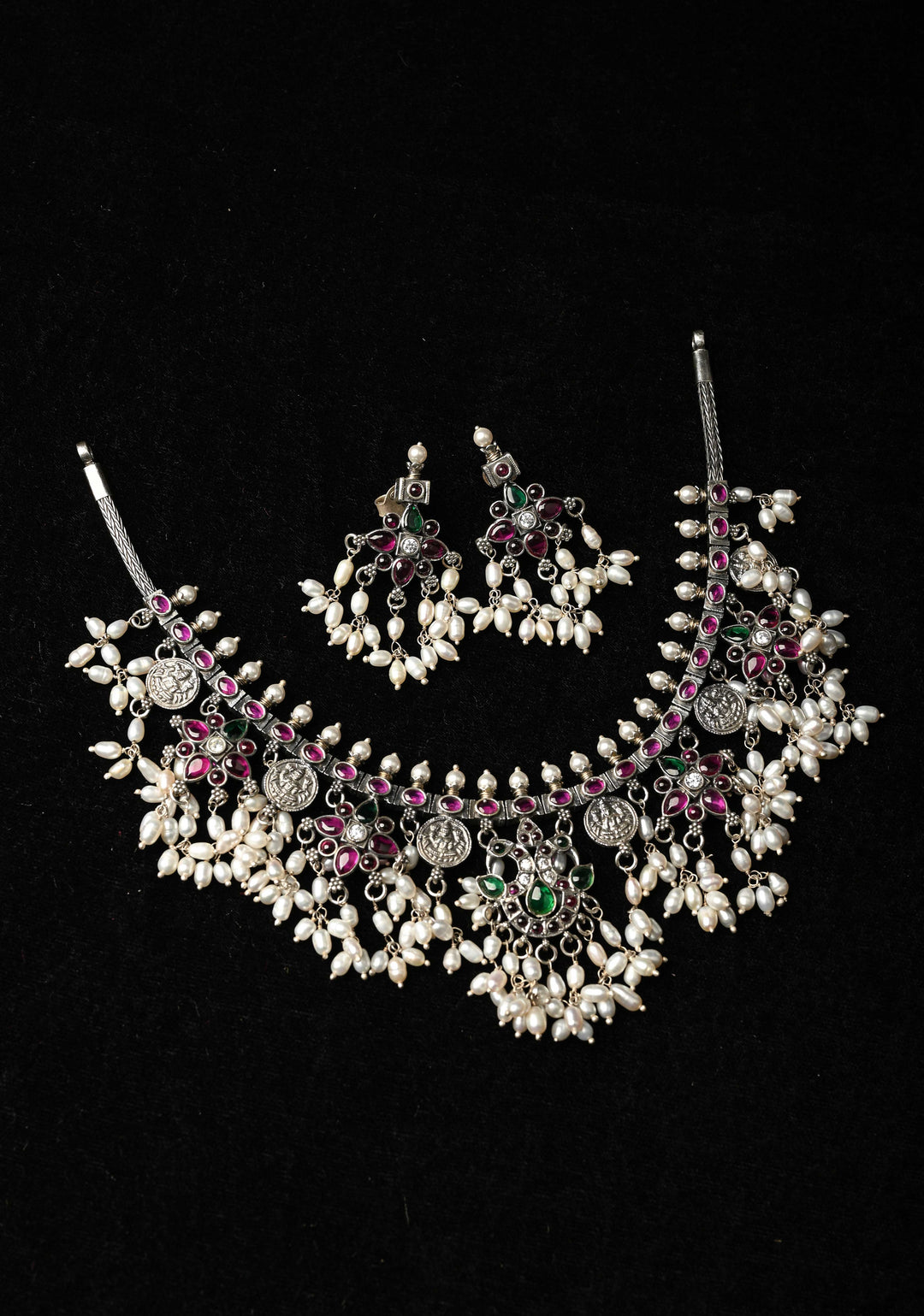 92.5 Silver Oxidized finish Guttausalu with coin charms.