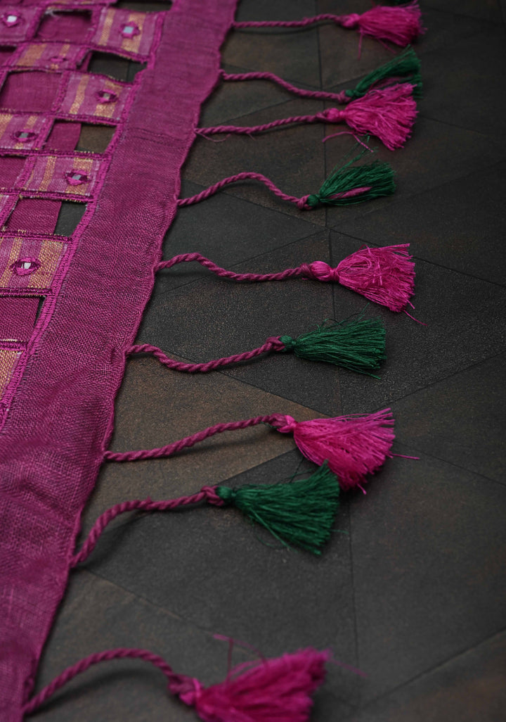 Magenta Cutwork and Mirror Work Tissue Linen Saree with dramatic tassels
