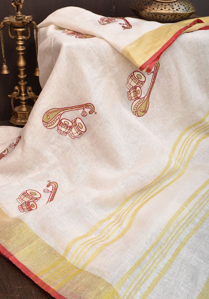 Linen by Linen Saree in White with Musical instruments embroidery motifs