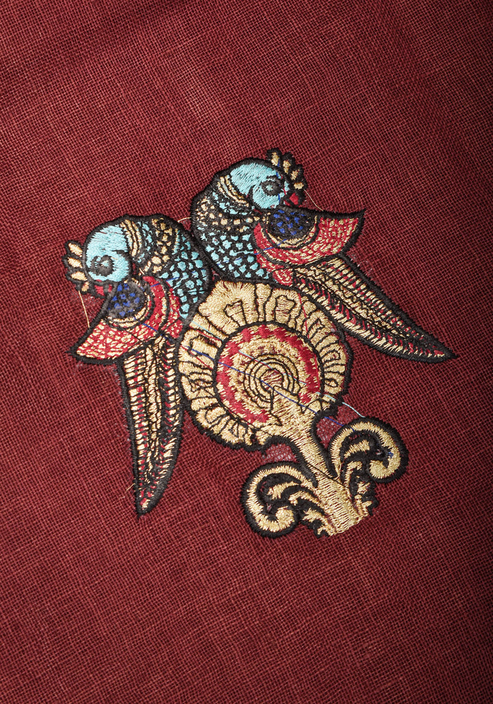 Tanjore Design Twin parrots embroidered motifs on maroon Linen by Linen Saree