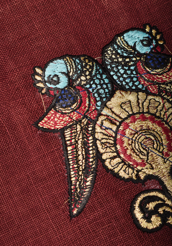 Tanjore Design Twin parrots embroidered motifs on maroon Linen by Linen Saree