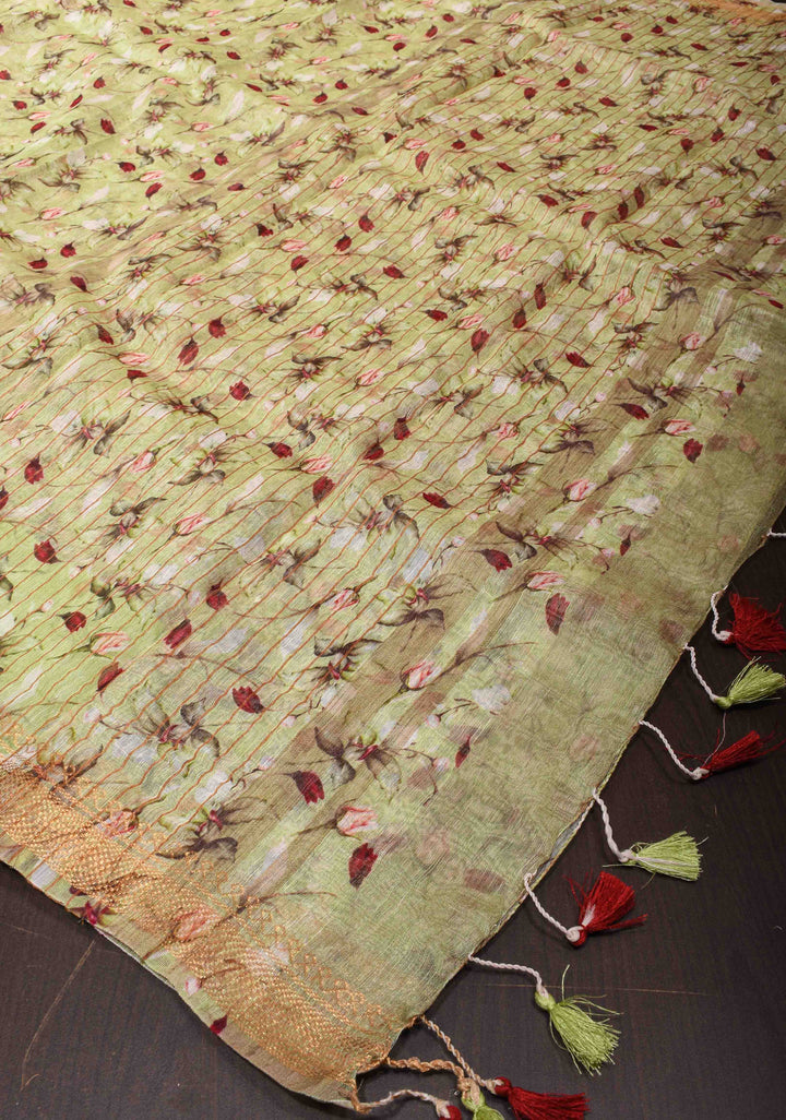 Pale Green Silk Linen Saree with Rose Floral Digital print, woven Zari Borders and long tassels
