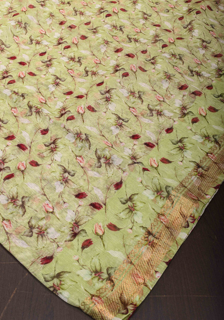 Pale Green Silk Linen Saree with Rose Floral Digital print, woven Zari Borders and long tassels