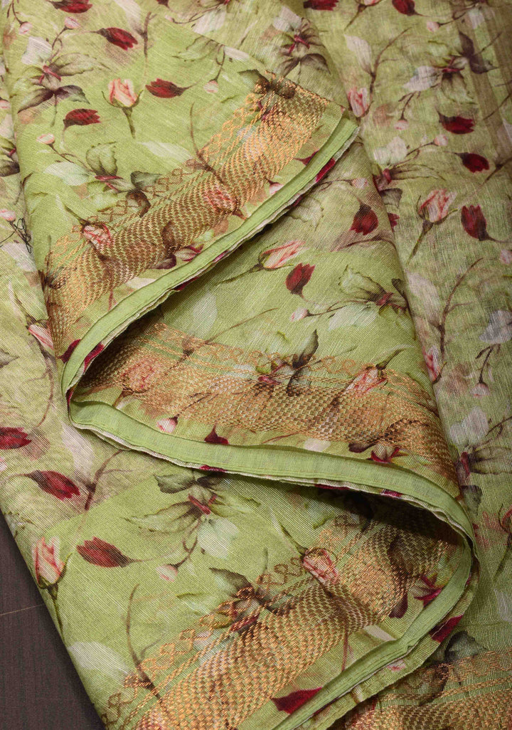 Pale Green Silk Linen Saree with Rose Floral Digital print, woven Zari Borders and long tassels