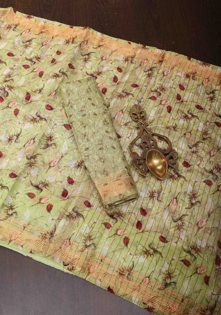 Pale Green Silk Linen Saree with Rose Floral Digital print, woven Zari Borders and long tassels