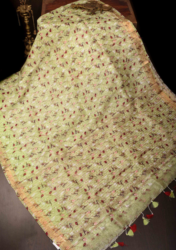 Pale Green Silk Linen Saree with Rose Floral Digital print, woven Zari Borders and long tassels
