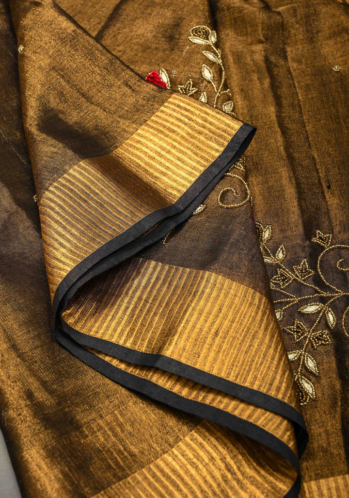 Hand Embroidery and Beadwork in copper and Black on Tissue Linen Saree