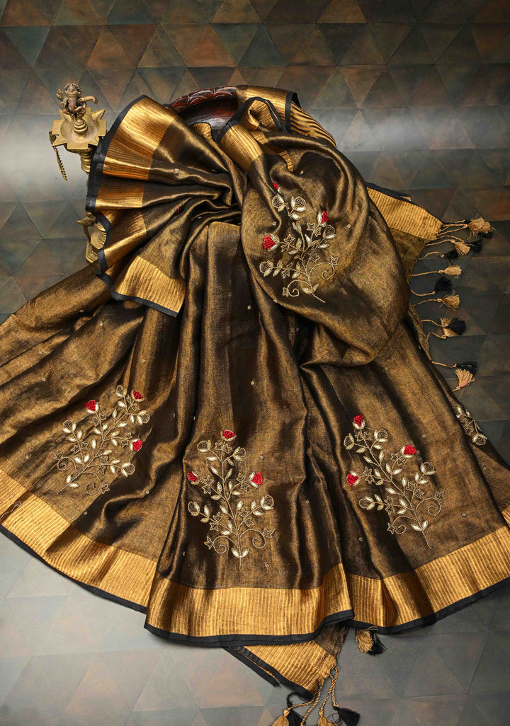 Hand Embroidery and Beadwork in copper and Black on Tissue Linen Saree
