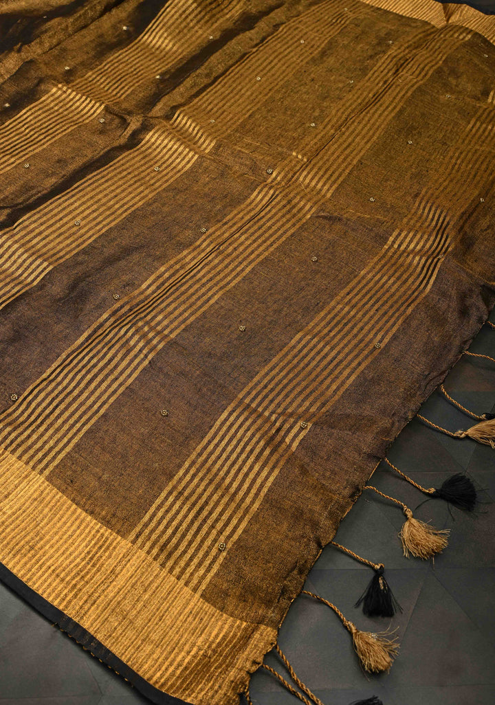 Hand Embroidery and Beadwork in copper and Black on Tissue Linen Saree