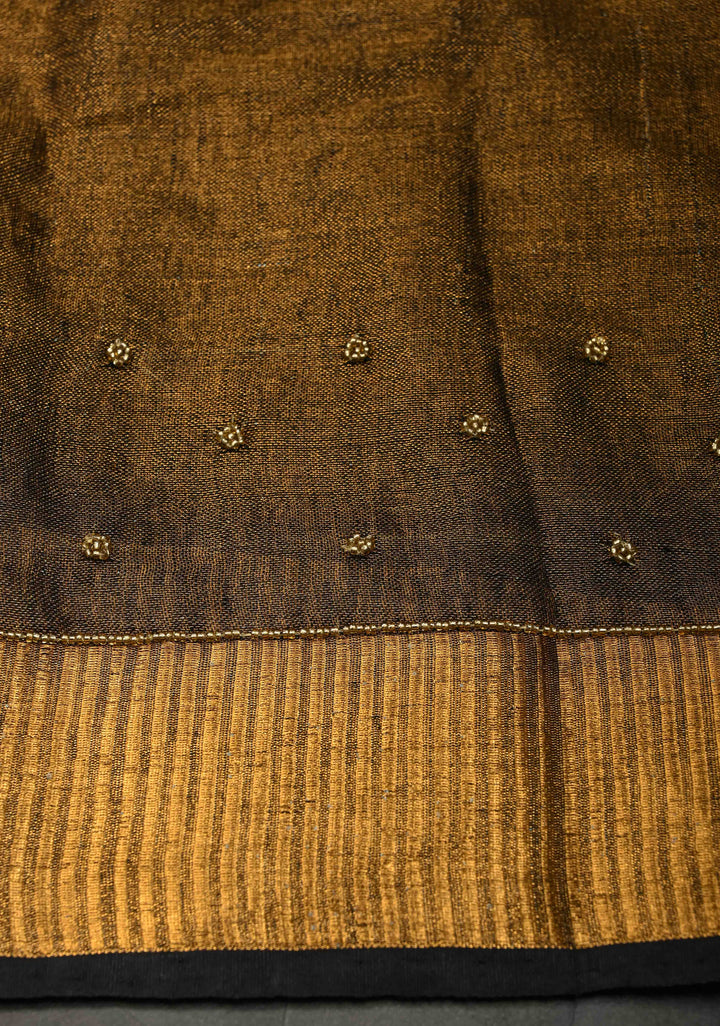 Hand Embroidery and Beadwork in copper and Black on Tissue Linen Saree