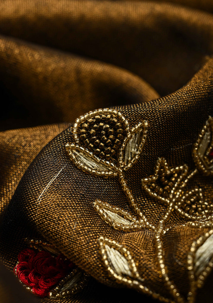 Hand Embroidery and Beadwork in copper and Black on Tissue Linen Saree