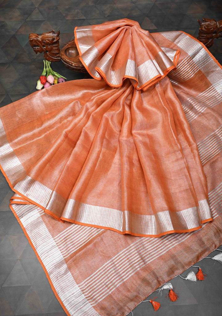 Orange Tissue Linen Saree with Silver Zari Border