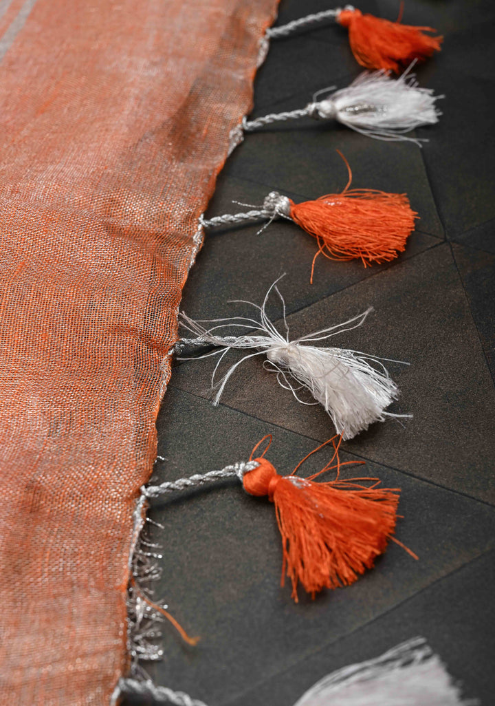 Orange Tissue Linen Saree with Silver Zari Border