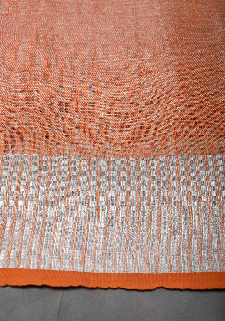 Orange Tissue Linen Saree with Silver Zari Border