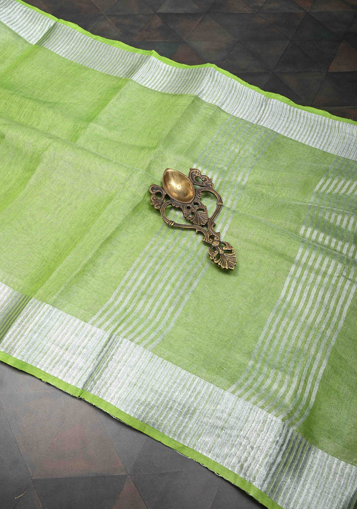 Light Green Tissue Linen Saree With Silver Zari Border