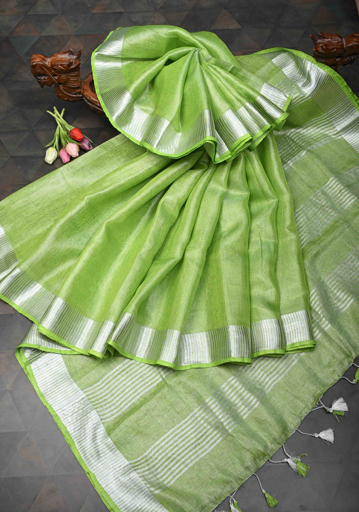 Light Green Tissue Linen Saree With Silver Zari Border