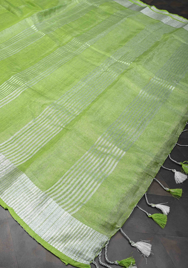 Light Green Tissue Linen Saree With Silver Zari Border