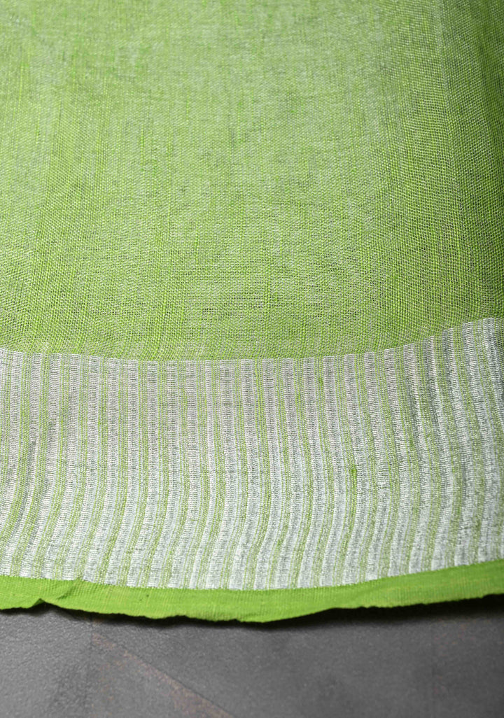 Light Green Tissue Linen Saree With Silver Zari Border