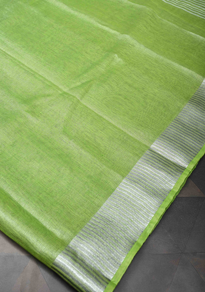 Light Green Tissue Linen Saree With Silver Zari Border