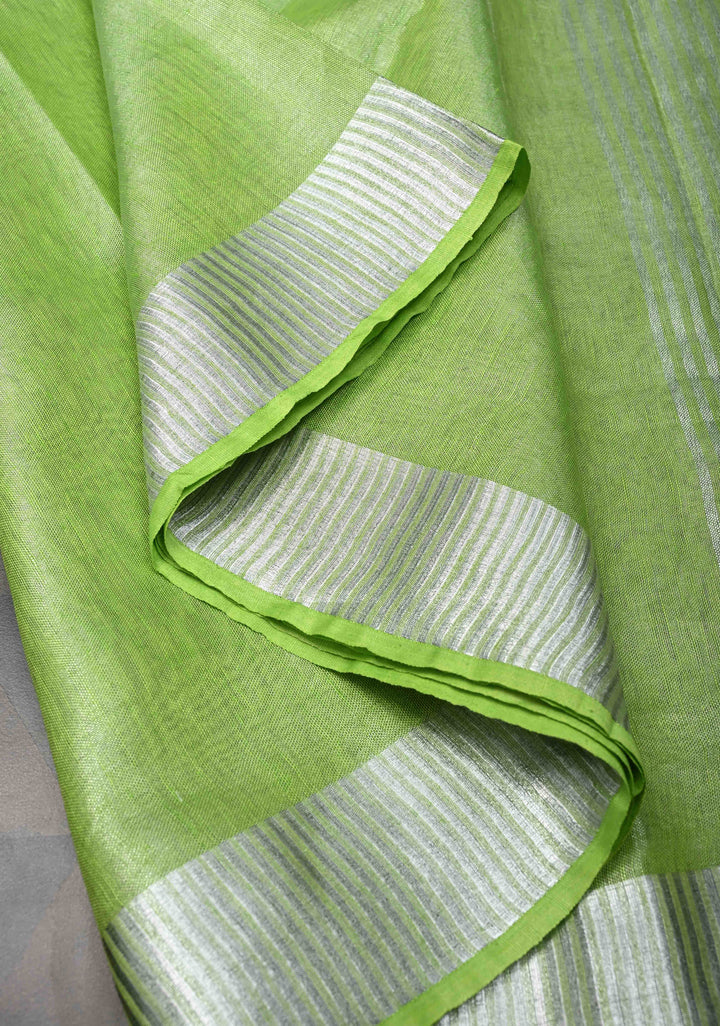 Light Green Tissue Linen Saree With Silver Zari Border