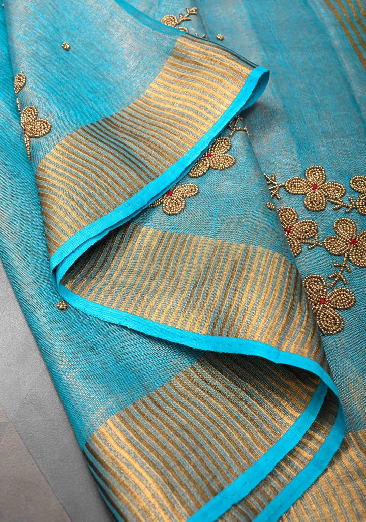 Bluish Cyan Tissue Linen Saree With Hand Beadwork with Golden Tissue