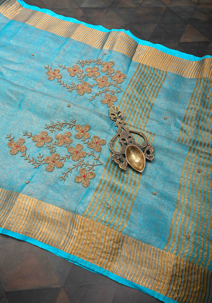 Bluish Cyan Tissue Linen Saree With Hand Beadwork with Golden Tissue