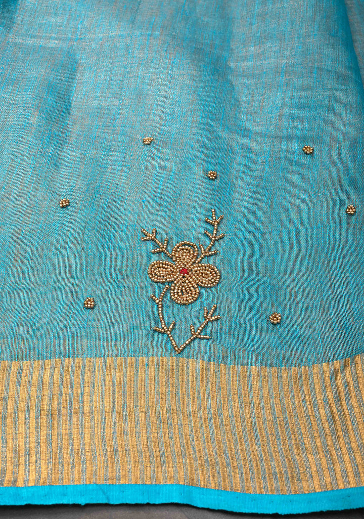 Bluish Cyan Tissue Linen Saree With Hand Beadwork with Golden Tissue