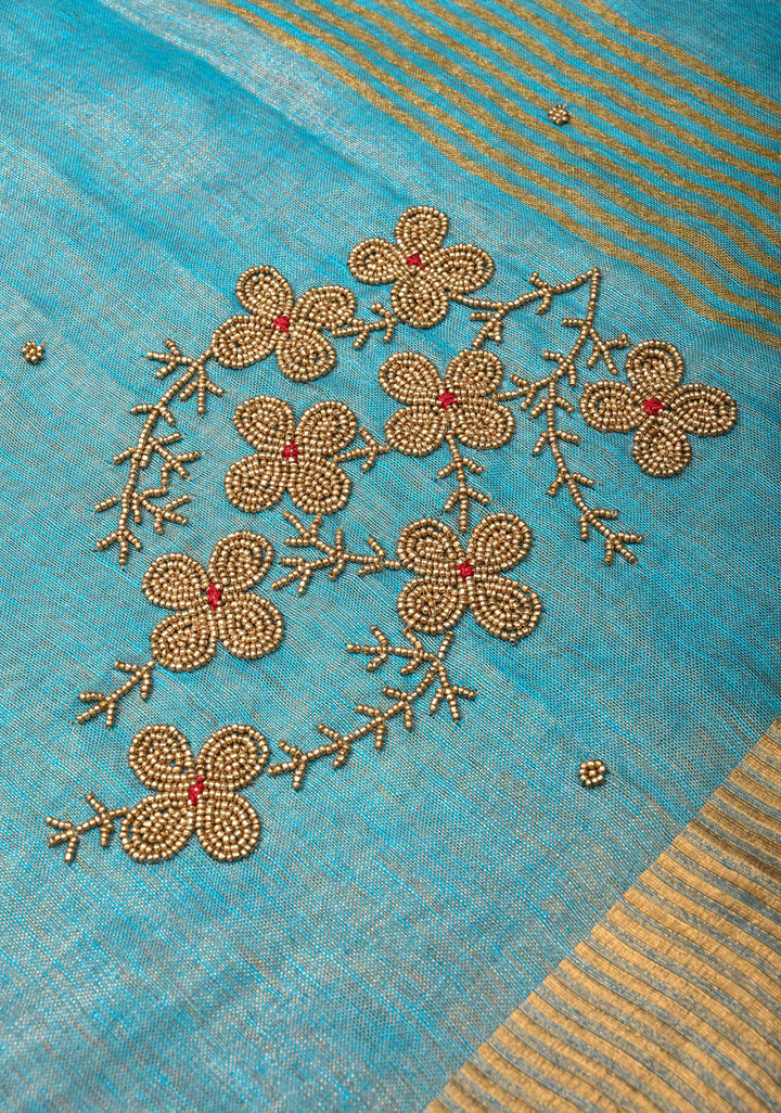 Bluish Cyan Tissue Linen Saree With Hand Beadwork with Golden Tissue