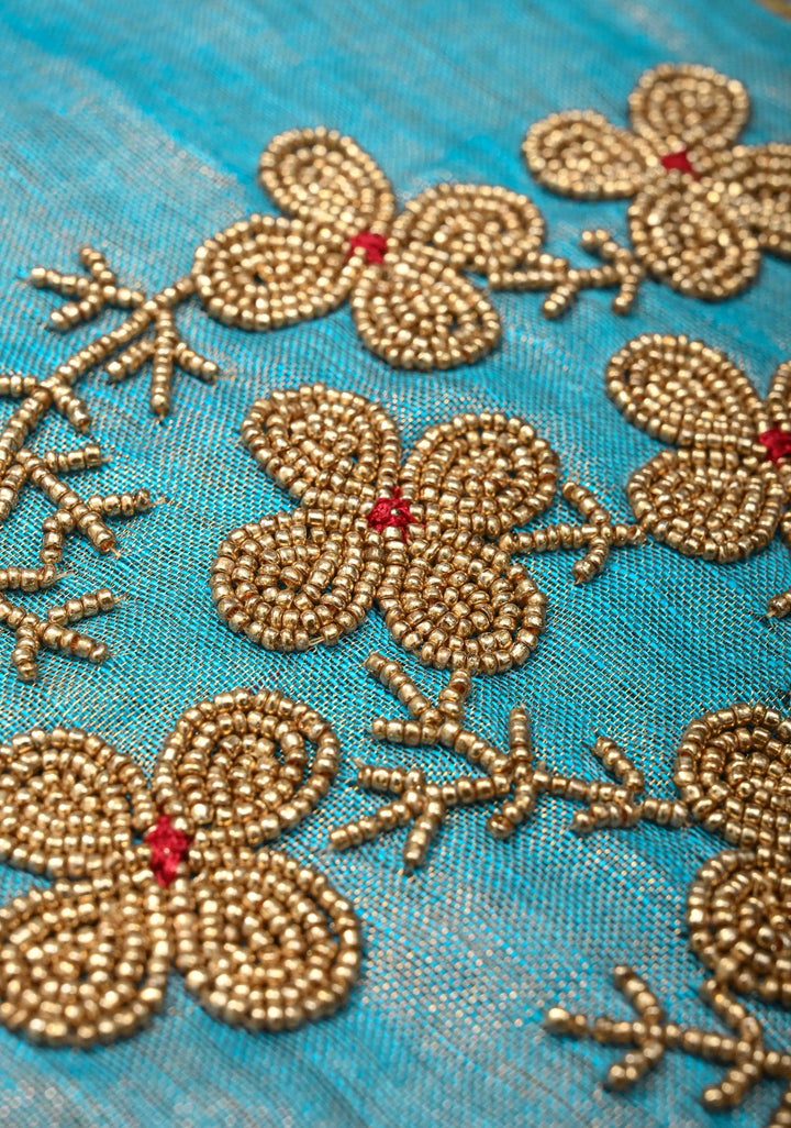 Bluish Cyan Tissue Linen Saree With Hand Beadwork with Golden Tissue