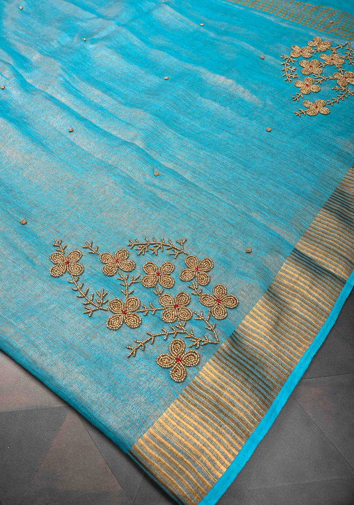 Bluish Cyan Tissue Linen Saree With Hand Beadwork with Golden Tissue