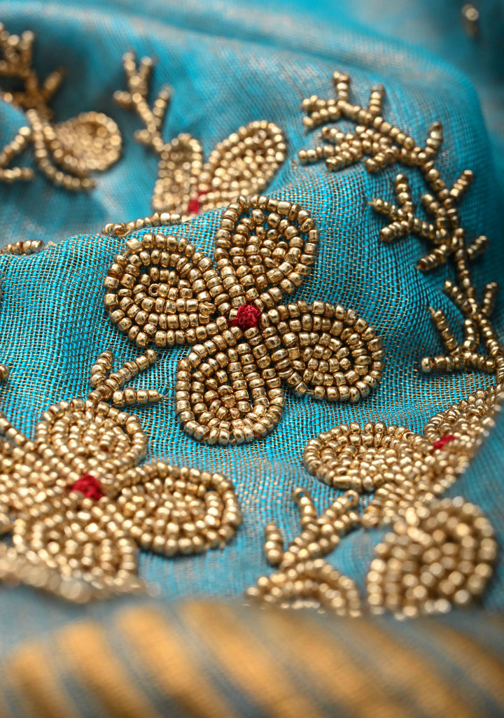 Bluish Cyan Tissue Linen Saree With Hand Beadwork with Golden Tissue
