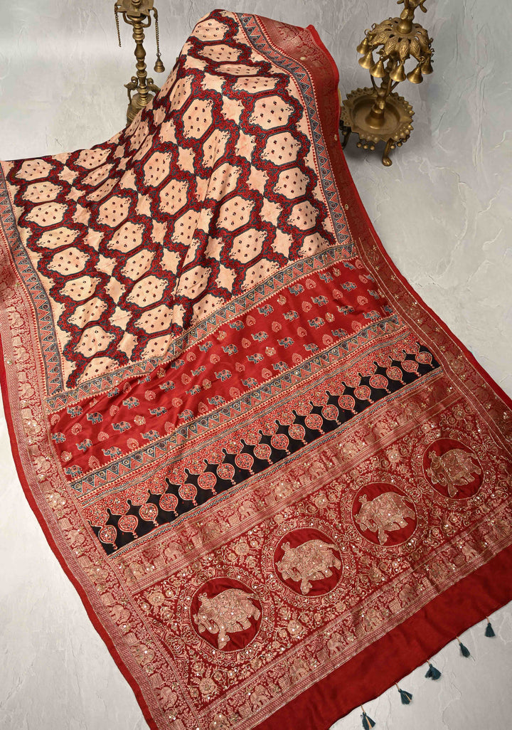 Red Ajrakh Hand Block Print on Dola Silk Saree with Cutdana-Sequins and Mirror Work Hand embroidery