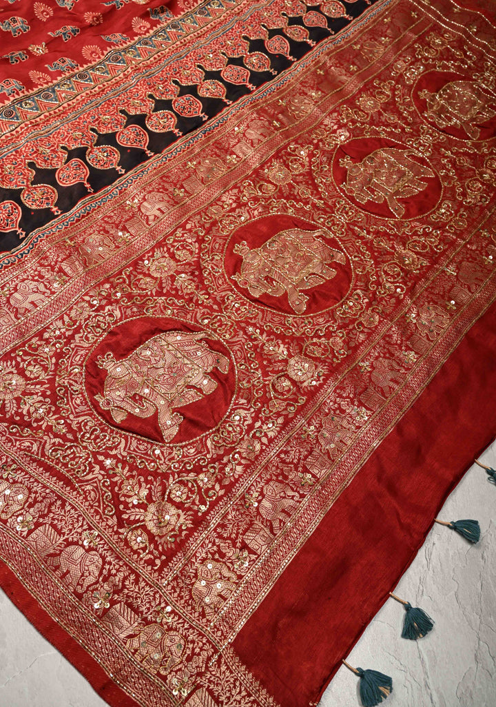 Red Ajrakh Hand Block Print on Dola Silk Saree with Cutdana-Sequins and Mirror Work Hand embroidery