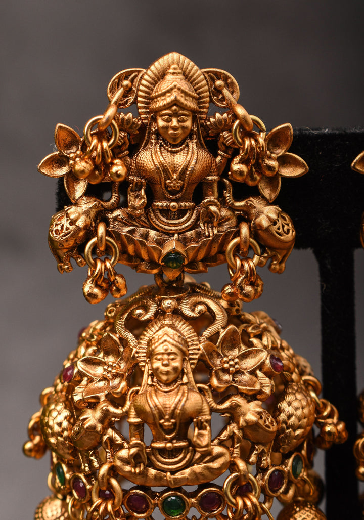 Antique Dark Gold Tone Lakshmi Design Prominent Jhumka earrings | Shobitam Jewelry