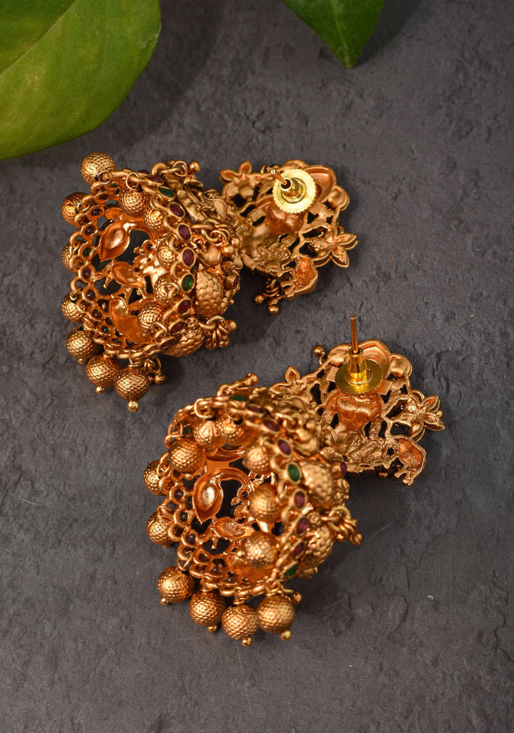Antique Dark Gold Tone Lakshmi Design Prominent Jhumka earrings | Shobitam Jewelry