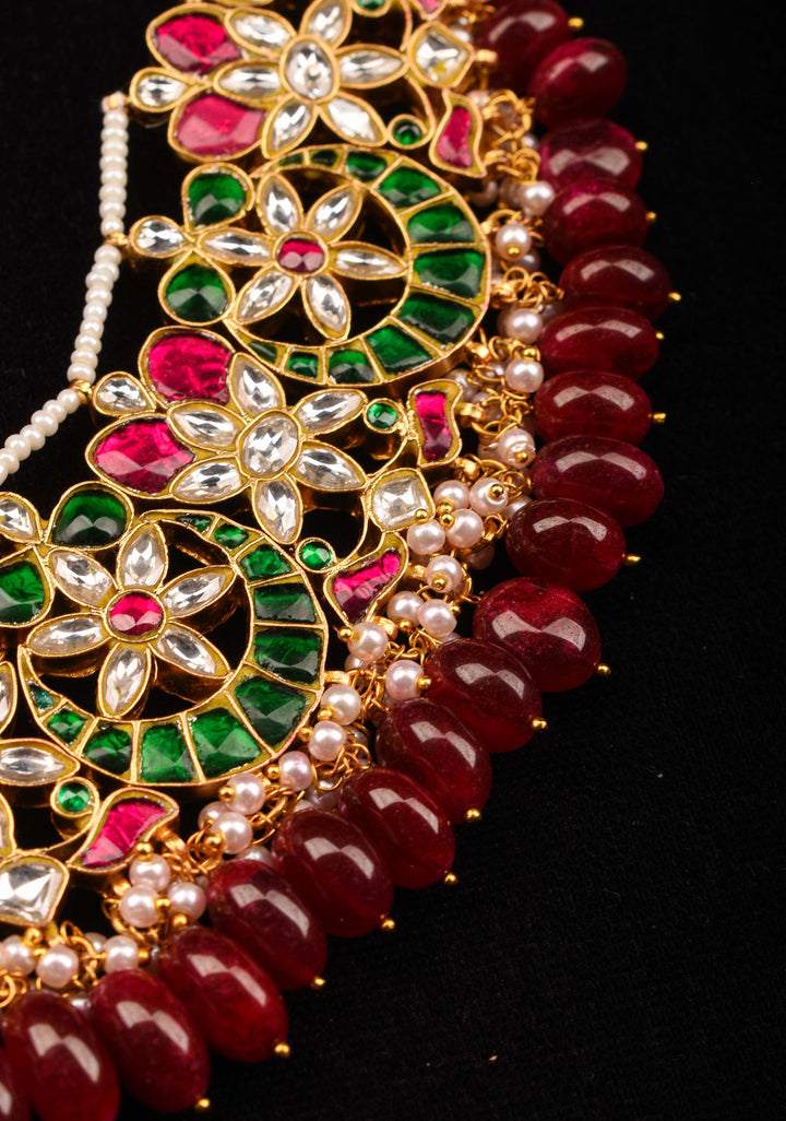 Celestial Ahmedabadi Jadau Necklace and Earrings Set with maroon dangling stones.