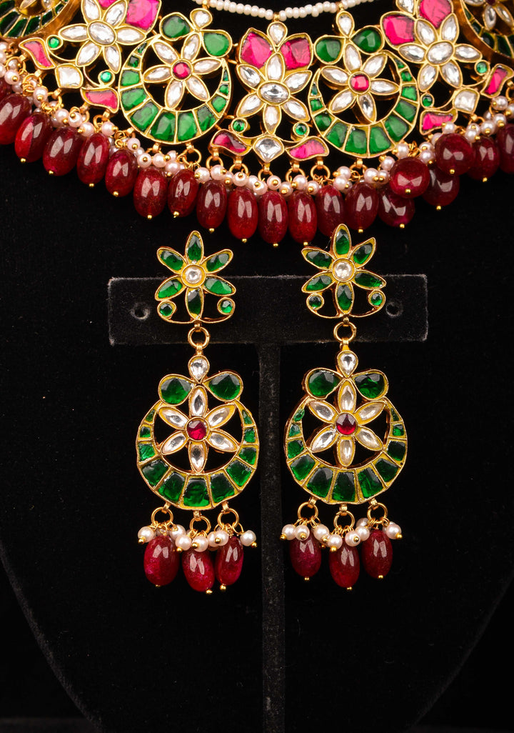 Celestial Ahmedabadi Jadau Necklace and Earrings Set with maroon dangling stones.