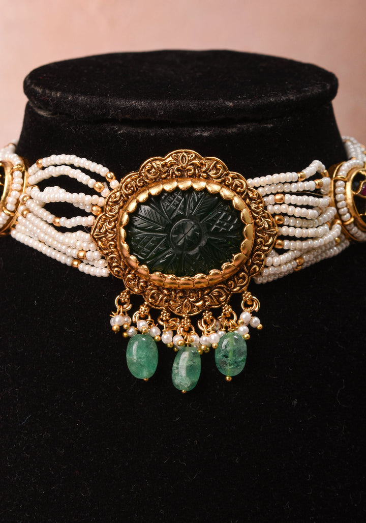 Antique Jadau Choker Set with 9 strand beads and prominent carved Green stone | Shobitam Jewelry