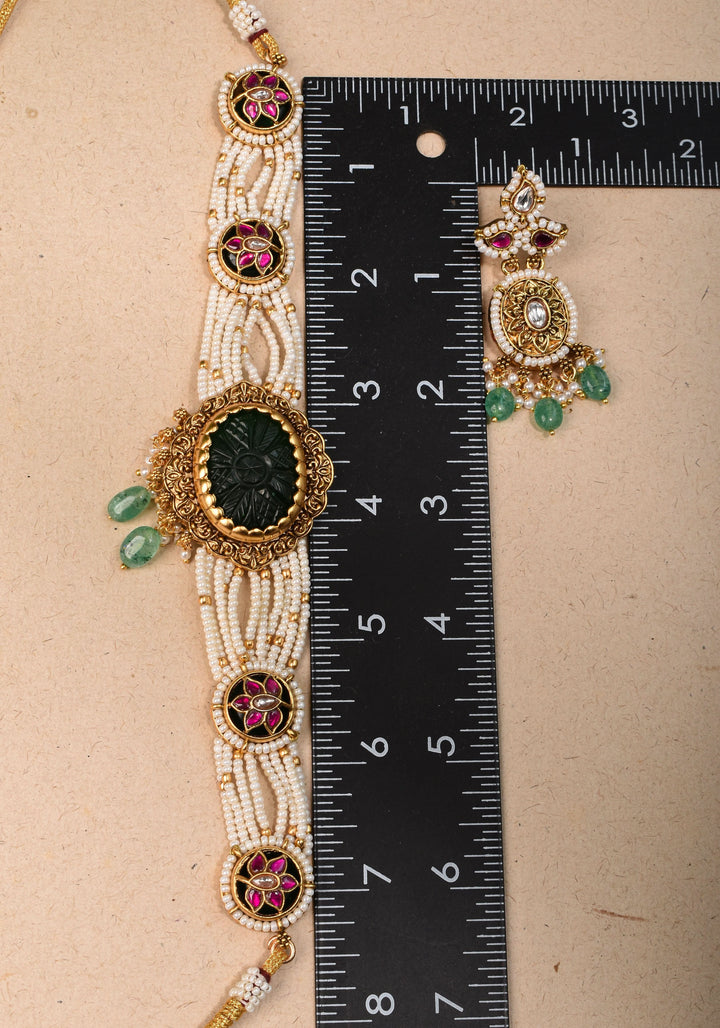 Antique Jadau Choker Set with 9 strand beads and prominent carved Green stone | Shobitam Jewelry