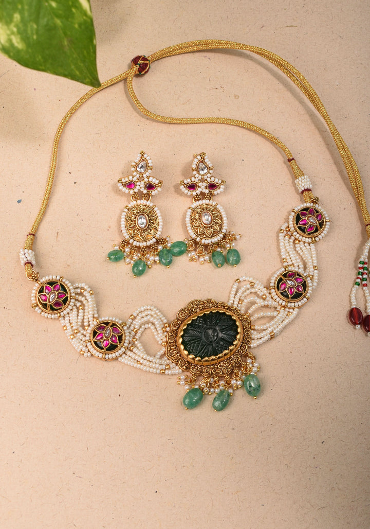 Antique Jadau Choker Set with 9 strand beads and prominent carved Green stone | Shobitam Jewelry