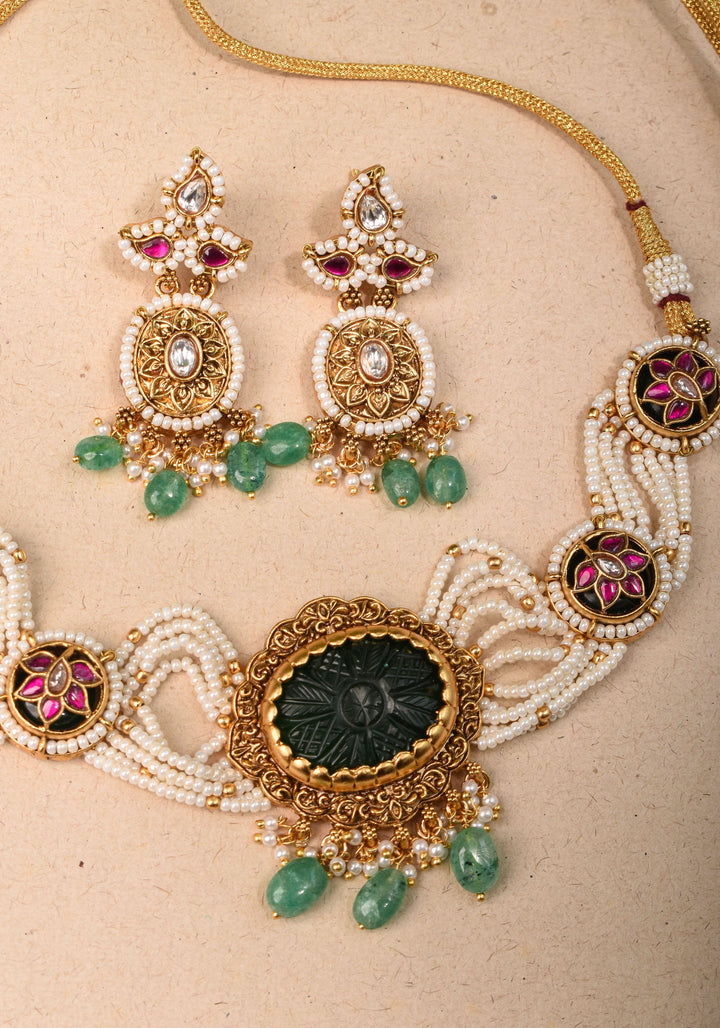 Antique Jadau Choker Set with 9 strand beads and prominent carved Green stone | Shobitam Jewelry