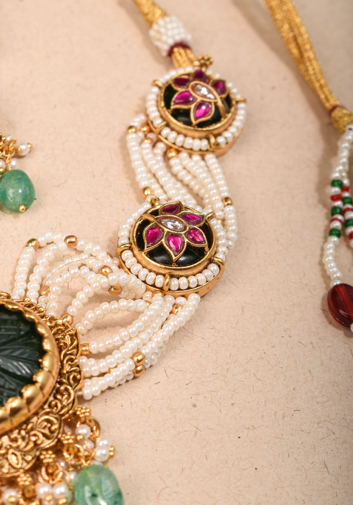 Antique Jadau Choker Set with 9 strand beads and prominent carved Green stone | Shobitam Jewelry
