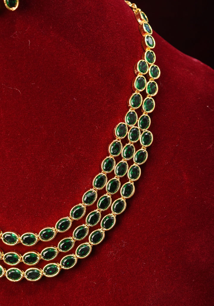 Green Stone Necklace with 3 strands of oval stones and matching earrings