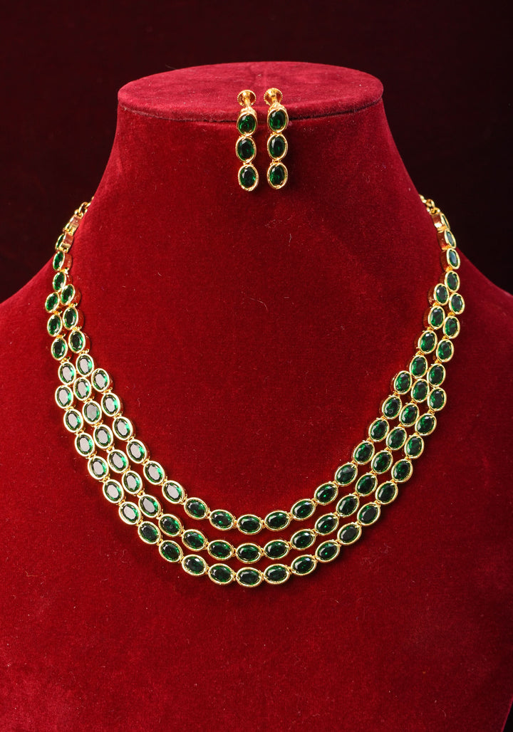 Green Stone Necklace with 3 strands of oval stones and matching earrings