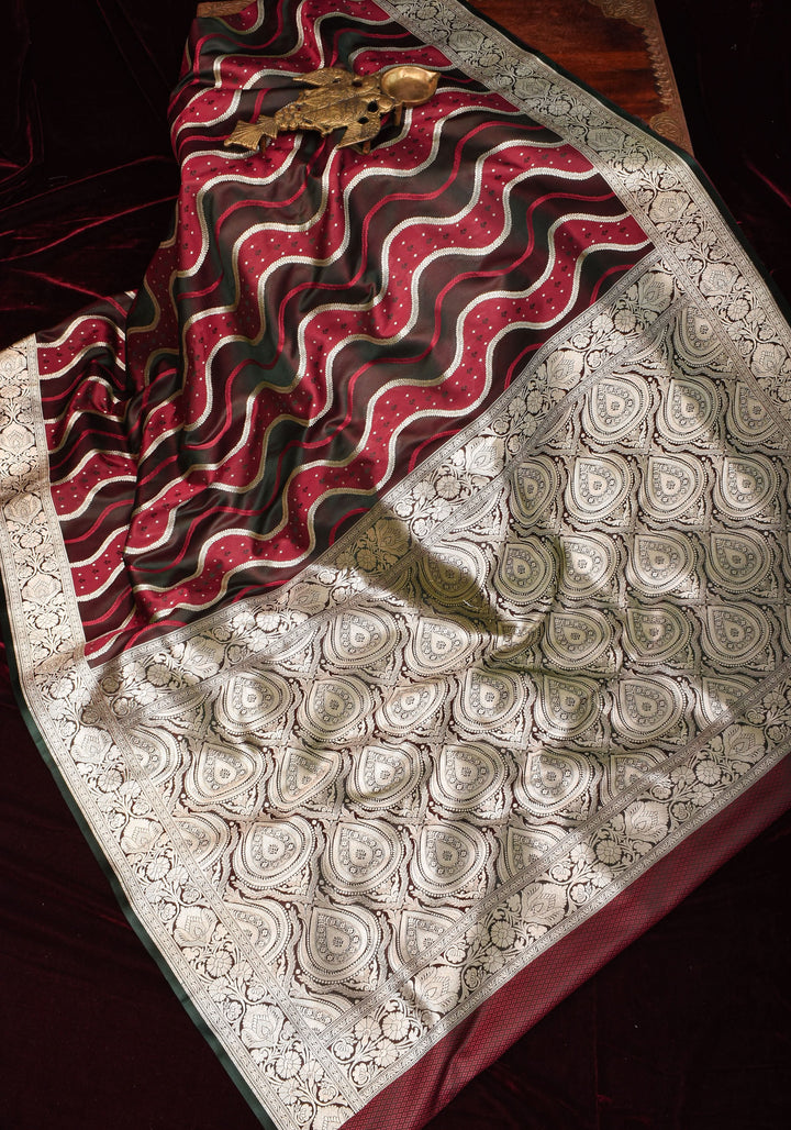 Maroon tone Exquisite Meenakari Vertical Wavy curve zari lines Semi Silk Saree and zari border