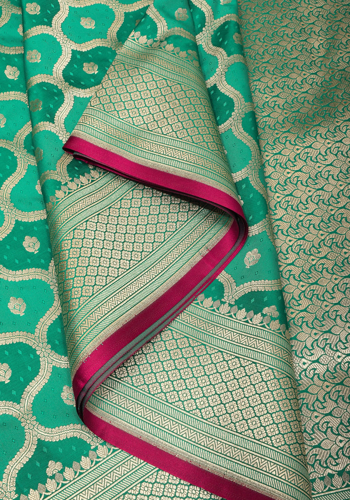 Teal green Moroccan trellis Zari jaal Semi Silk Saree and zari border