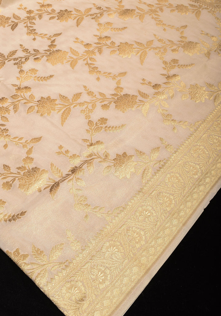 Ivory Tissue Semi silk saree with leheria Zari Floral vine Pattern and Meenakari Zari Pallu