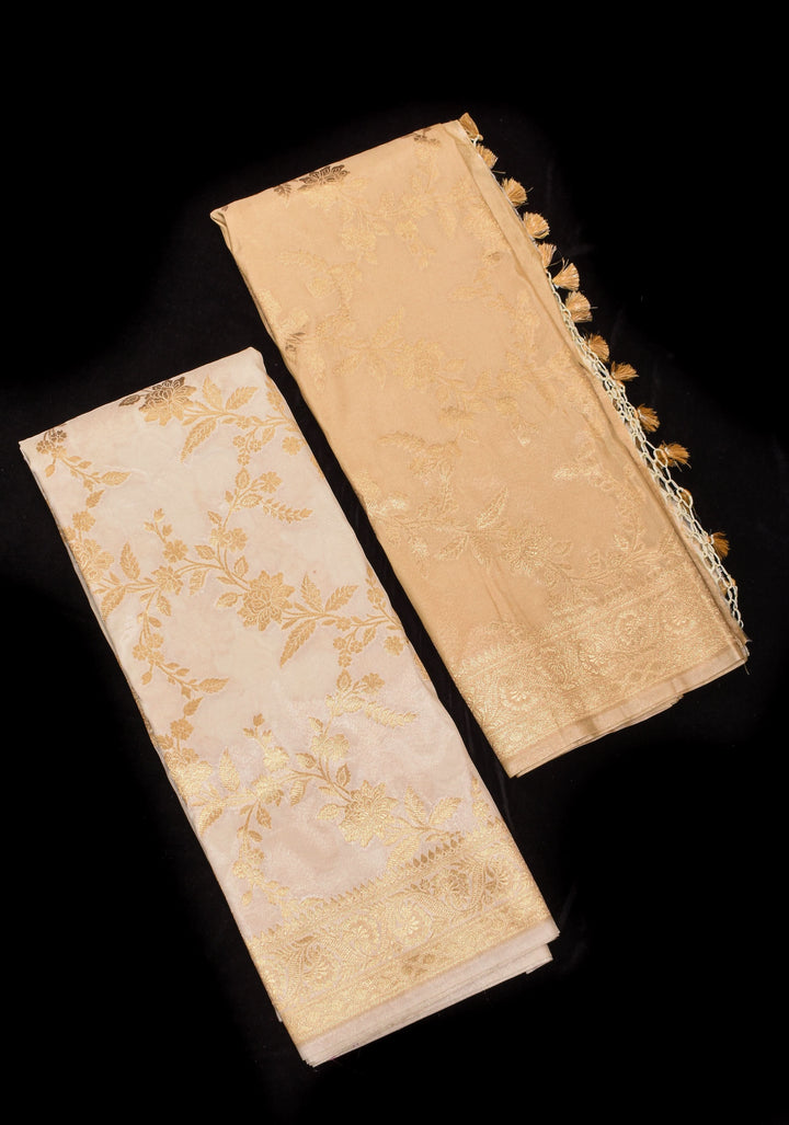 Ivory Tissue Semi silk saree with leheria Zari Floral vine Pattern and Meenakari Zari Pallu