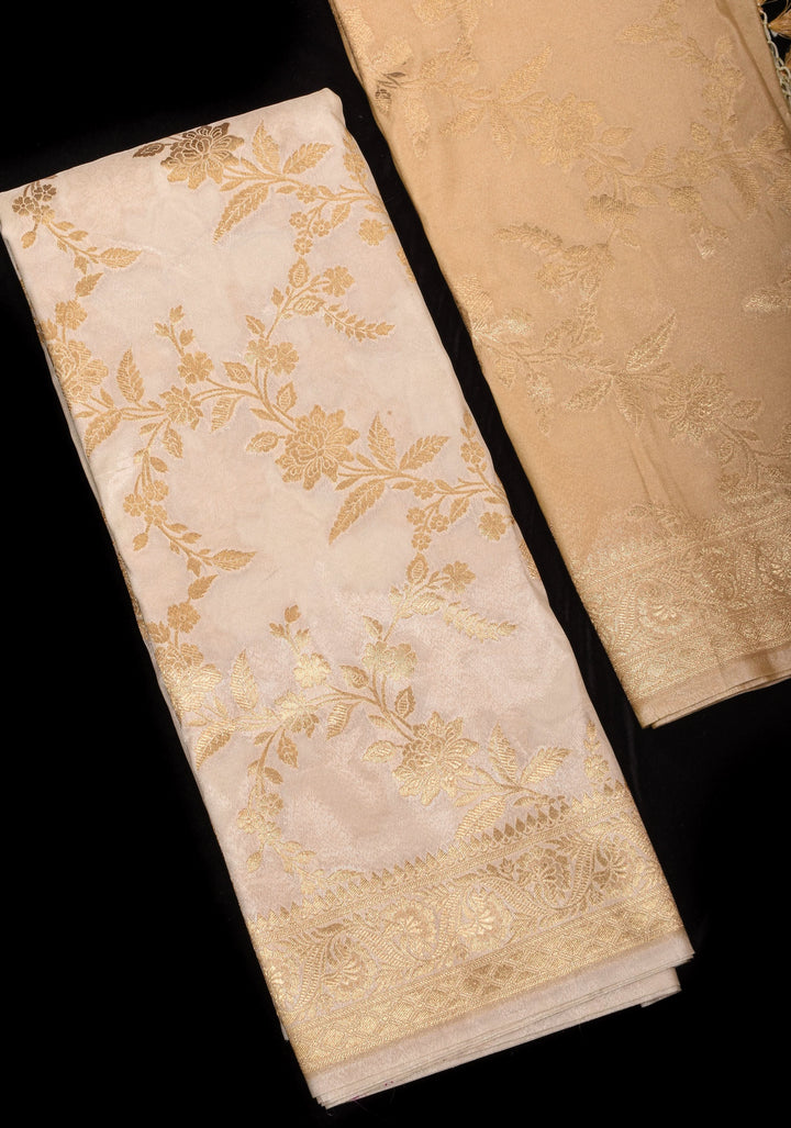 Ivory Tissue Semi silk saree with leheria Zari Floral vine Pattern and Meenakari Zari Pallu