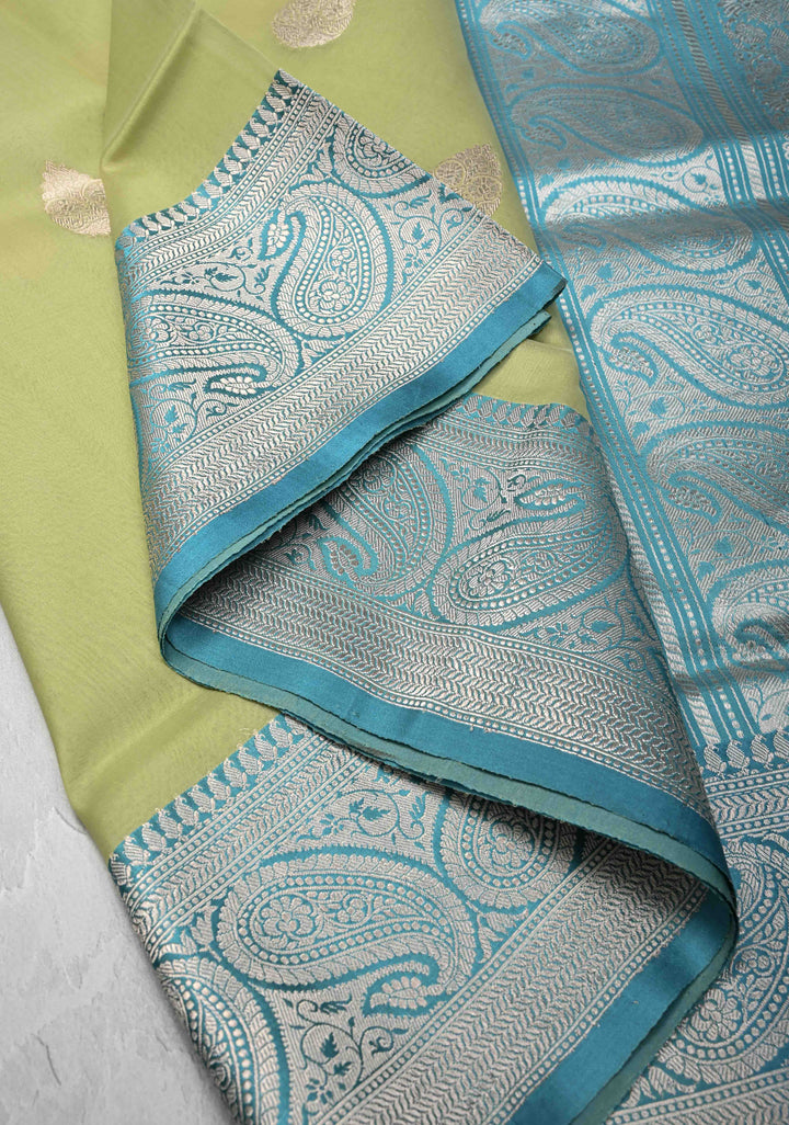 Tea Green Pure Banarasi Kora Silk Saree with Zari Buttas and Contrast Paisley Border | SILK MARK CERTIFIED